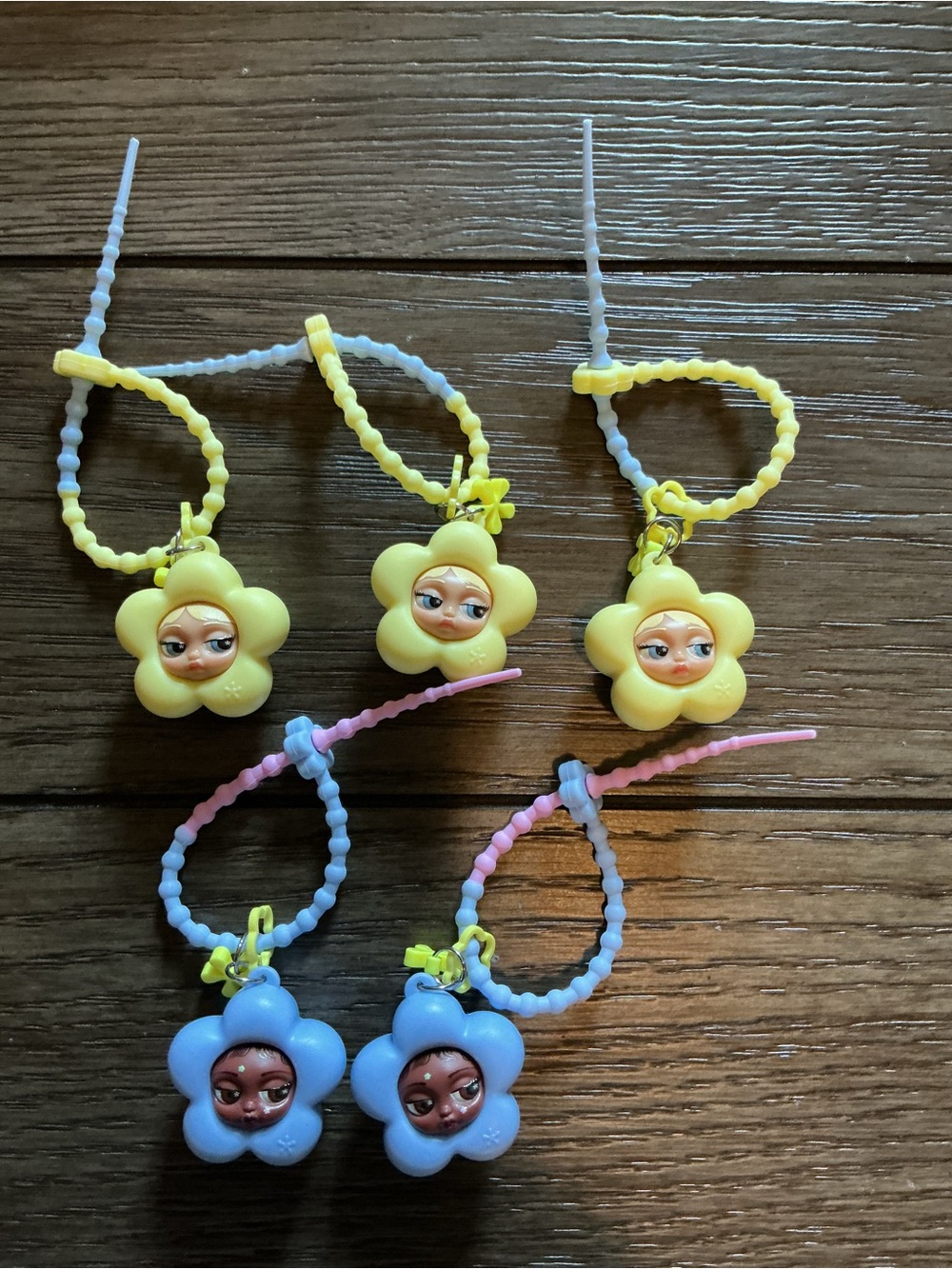 A lot of 5 DAISE Mini Dollface Charms/ 3 SUNNY 2 LOWKEY